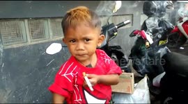 Indonesian toddler smokes 40 cigarettes a day