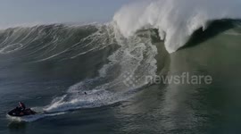 Wipe out! Surfer is engulfed by monster wave off coast of Portugal