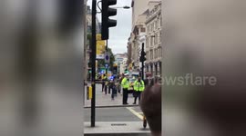 Cyclist killed in central London named as Queen's doctor Peter Fisher