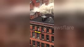 Firefighters tackle large blaze in Manchester's Chinatown