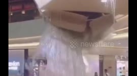 Ceiling collapses at Chinese mall after torrential rainfall