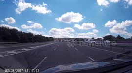 Truck driver using hard shoulder to undertake