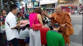 Monk Offerings at the Morning Market in Hatyai Thailand