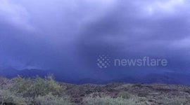 Ominous clouds roil in dramatic time lapse