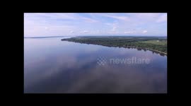 Breathtaking drone footage takes viewers high above a lake in Quebec