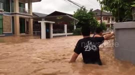 River busts banks in Thailand after downpour