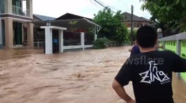 River busts banks in Thailand after downpour