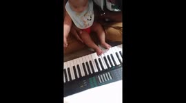 Our Baby is playing piano