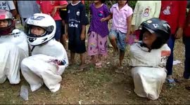 Locals take part in SACK RACE to celebrate Indonesia Independence Day