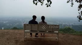 Girl Teaching his Boy Friend How to do Leg Exercise
