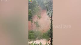 Trees and homes uprooted in a massive landslides which left four dead, in India