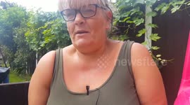 A brave mum fought off four thugs who forced their way into her home armed with knives - by bashing them with a toy car