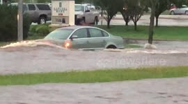 Roads turned into raging rivers, cars half-submerged as flash floods hit Madison