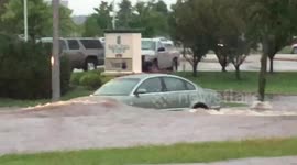 Roads turned into raging rivers, cars half-submerged as flash floods hit Madison