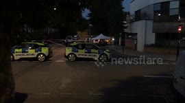 Maida Hill gun violence. Police begin to remove crime scene.