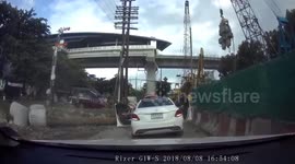 Terrifying moment four-tonne steel pipe falls onto woman's car