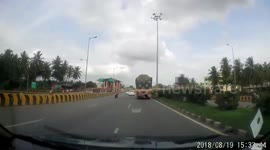 Heart-stopping moment five-year-old is left alone on moving motorbike following crash on busy highway