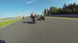 Motorcycle riders tumble in air after high-speed collision
