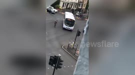 UK man yells at passing vehicles in middle of busy road