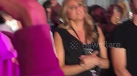 Liam Payne and Rita Ora filmed dancing intimately and hugging behind the scenes at concert