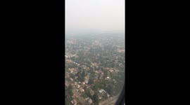 View from flight into Seattle shows city smothered in wildfire smoke