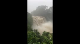 Waterfall turned into a raging cascade of floodwaters as Hurricane Lane edges closer to Big Island