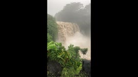 Tranquil waterfall turned into raging cascade of floodwaters as Hurricane Lane intensifies
