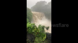 Tranquil waterfall turned into raging cascade of floodwaters as Hurricane Lane intensifies