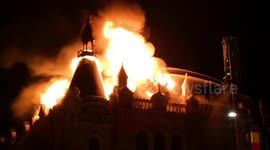 Scores of firefighters battle blaze at Romanian palace