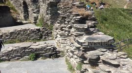 Visitors clamber over Tintagel Castle, Cornwall, 2018