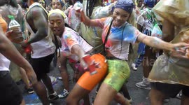 Thousands turn out for Notting Hill Carnival in London despite heavy rain