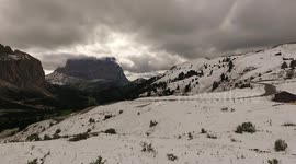 Rare snowfall covers the Italian Alps during summer