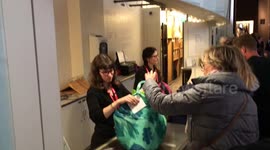 Visitors pay by weight at British Museum cloakroom