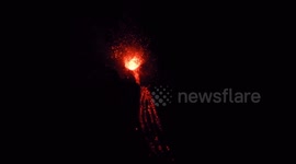Italy's Mount Etna spews ash and lava overnight