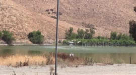 Helicopter picks up water to fight Holy Fire flare-up in Cleveland National Forest
