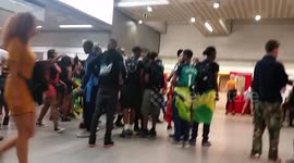 Notting Hill revelers crowd King's Cross station