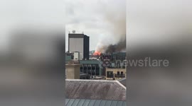 Video from roof of nearby building shows blaze