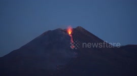 Active Mount Etna spews lava at dawn