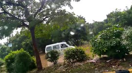 Commuters stranded in floodwaters in Gurgaon, India
