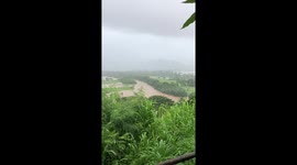 Hanalei River overflowing from heavy rains from hurricane Lane