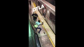 Shocking moment man on LA subway platform whips commuter with belt