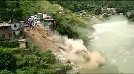 Landslide wipes out building just inches from villagers