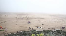 Freak weather hits Woolacombe Beach in Devon on UK's hottest day of the year