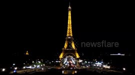 The Eiffel Tower sparkles at night