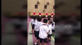 Scantily-clad pole-dancers greet Chinese kindergarten pupils on return to classroom
