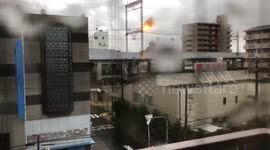 Part of roof explodes after touching wires during Typhoon Jebi