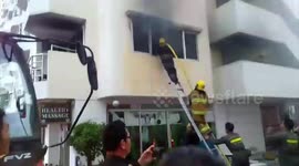 Tourists flee as flames break out in busy Thai hotel