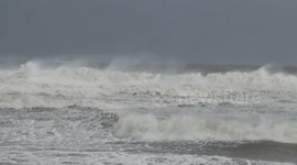 Latest band from Tropical Storm Gordon brings rough surf to Gulf Shores, Alabama