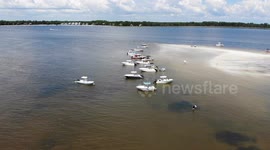 boaters party on beach during Labor Day weekend