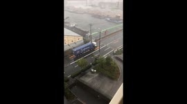 Truck crosses a bridge during Typhoon Jebi